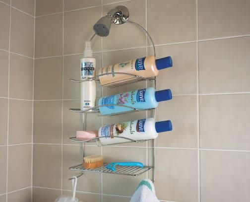 Chrome shower caddy with multiple shelves holding shampoo, conditioner, and soap bottles.